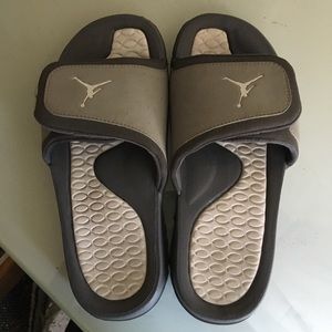 Grey and white Jordan slides